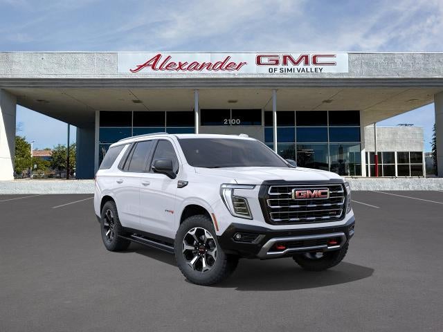2026 GMC Yukon AT4 in Summit White — front three-quarter view