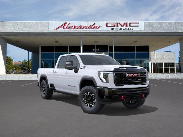 2026 GMC Sierra 2500 HD AT4X in Summit White — front three-quarter view