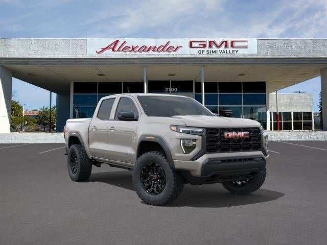 2026 GMC Canyon Elevation in Coastal Dune — front three-quarter view
