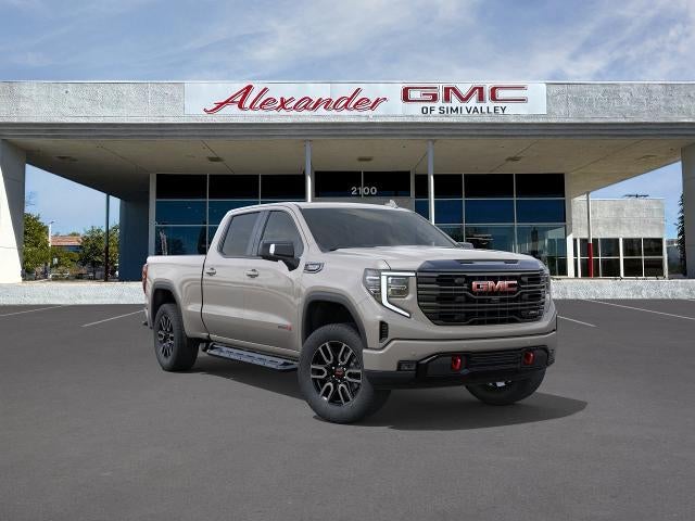 2026 GMC Sierra 1500 AT4 in Coastal Dune — front three-quarter view