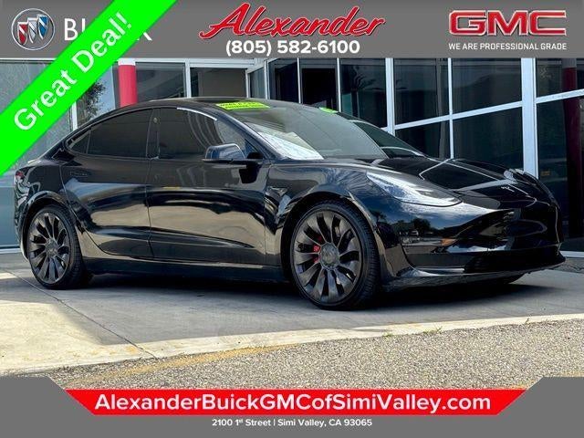 2022 Tesla Model 3 Performance in Black — front three-quarter view