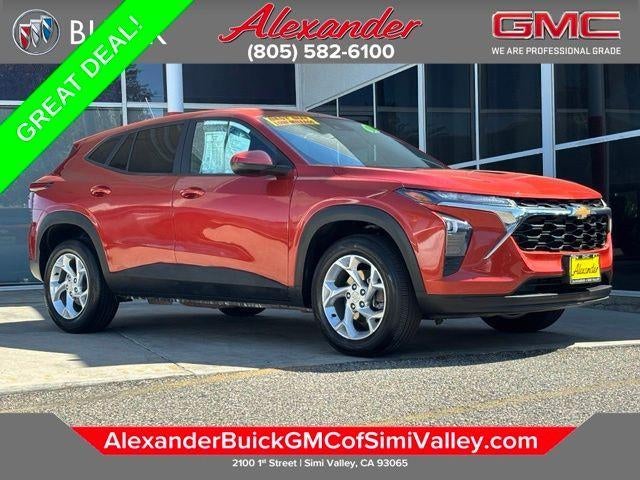 2024 Chevrolet Trax LS in Cayenne Orange Metallic — front three-quarter view